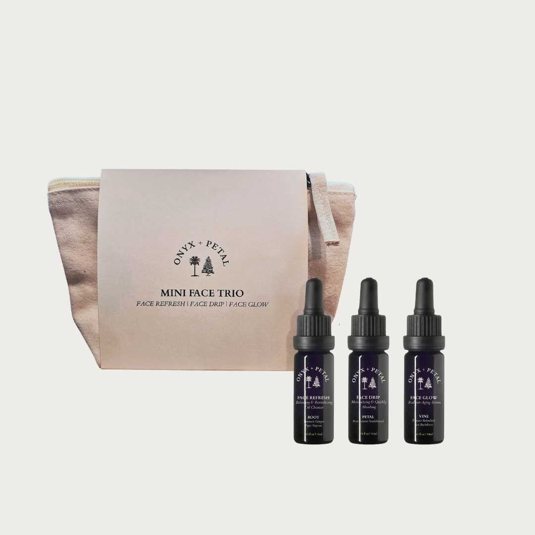 Onyx + Petal Mini Face Trio with a pouch on a light beige background